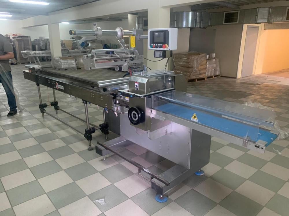 Горизонтальный упаковщик флоупак CARINA