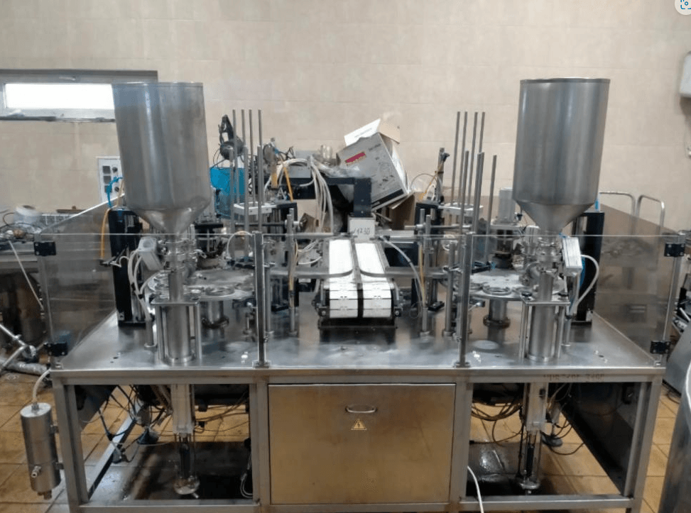 Фасовочный автомат в стаканчикТФ ПАСТ ПАК 2Р двухкарусельный  инв.9097