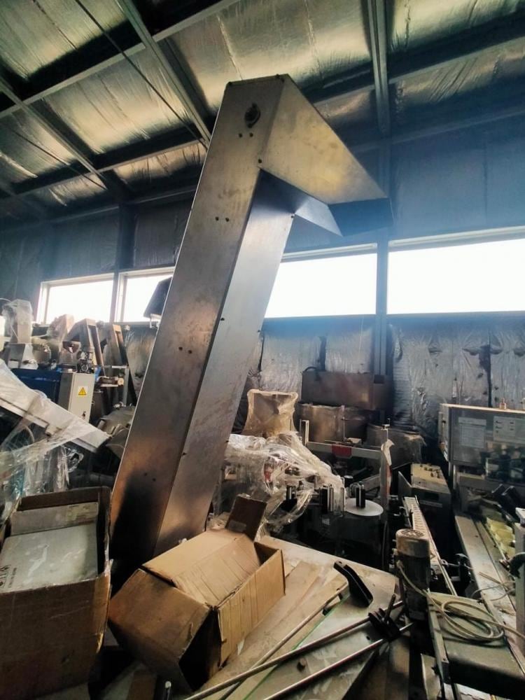 Подъемный транспортер