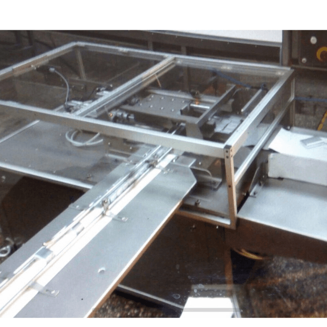 Автоматический упаковщик масла в гофроящик