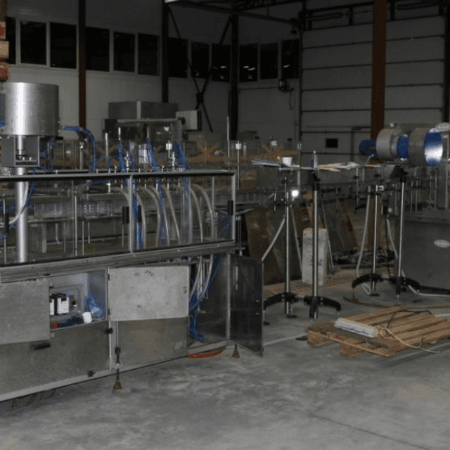 Линия розлива в ПЭТ 3000 бут/час объемом 1л.