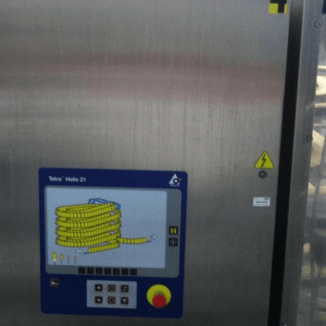 Накопитель упаковки Helix-21 спирального типа, производства Тетра Пак.