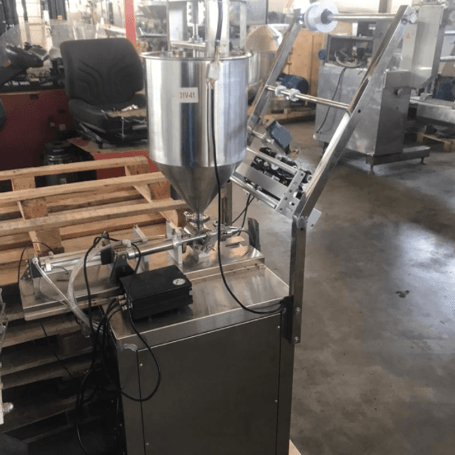 Фасовщик в трех-шовный пакет инв.9615