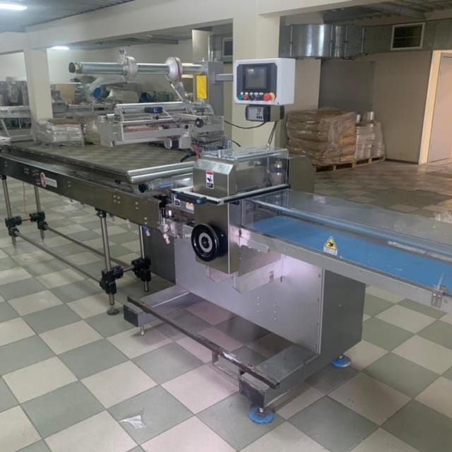 Горизонтальный упаковщик флоупак CARINA