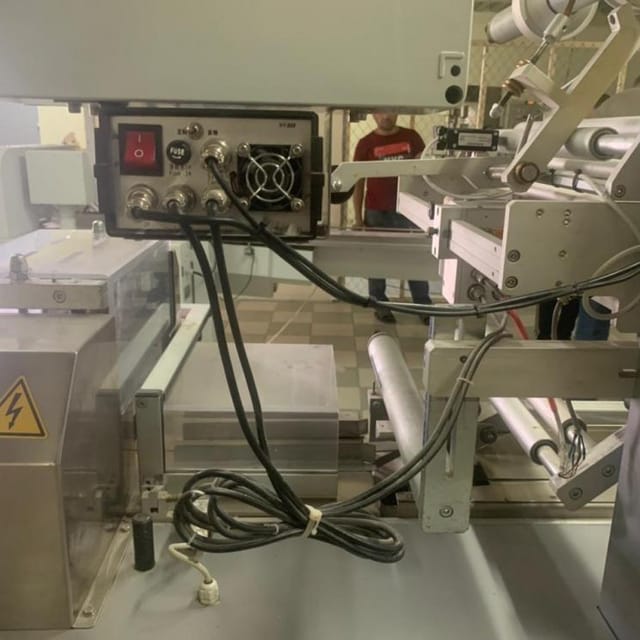 Горизонтальный упаковщик флоупак CARINA