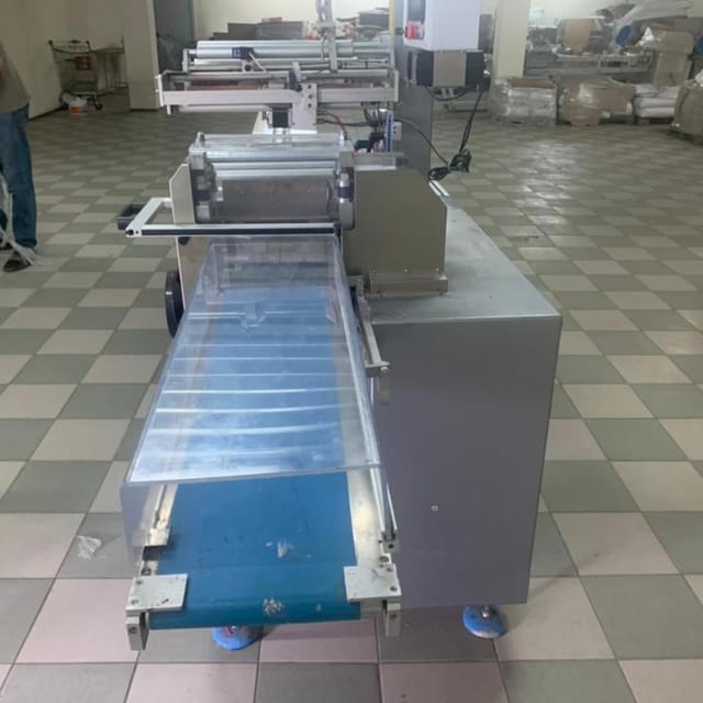 Горизонтальный упаковщик флоупак CARINA