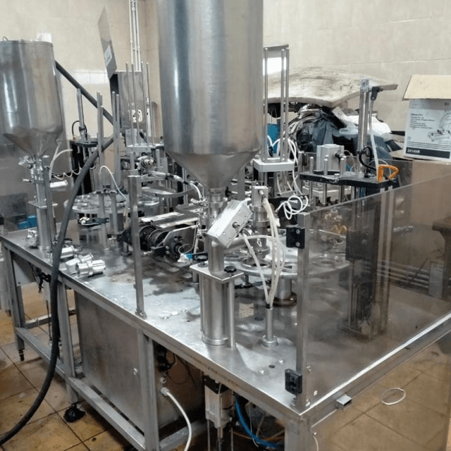 Фасовочный автомат в стаканчикТФ ПАСТ ПАК 2Р двухкарусельный  инв.9097