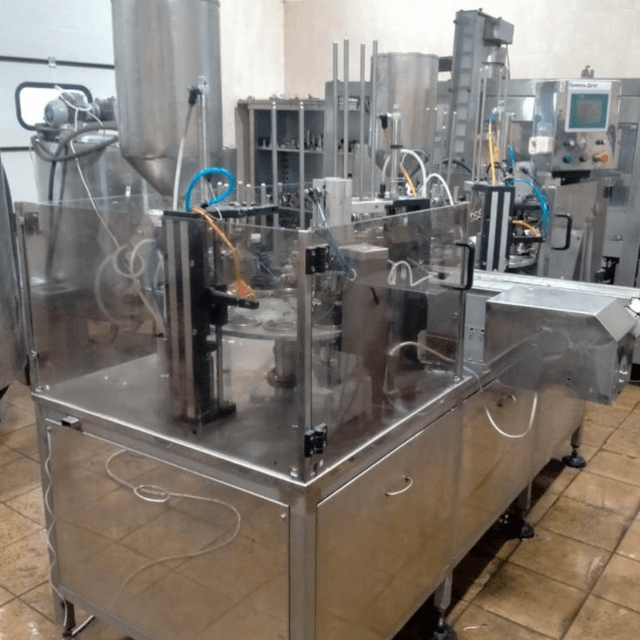 Фасовочный автомат в стаканчикТФ ПАСТ ПАК 2Р двухкарусельный  инв.9097