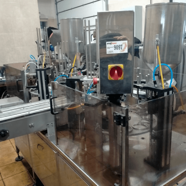 Фасовочный автомат в стаканчикТФ ПАСТ ПАК 2Р двухкарусельный  инв.9097