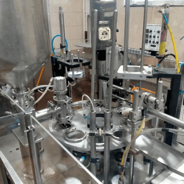 Фасовочный автомат в стаканчикТФ ПАСТ ПАК 2Р двухкарусельный  инв.9097