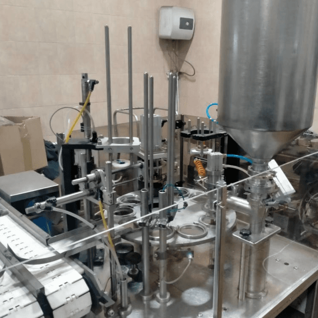 Фасовочный автомат в стаканчикТФ ПАСТ ПАК 2Р двухкарусельный  инв.9097