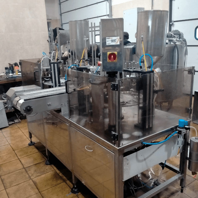 Фасовочный автомат в стаканчикТФ ПАСТ ПАК 2Р двухкарусельный  инв.9097