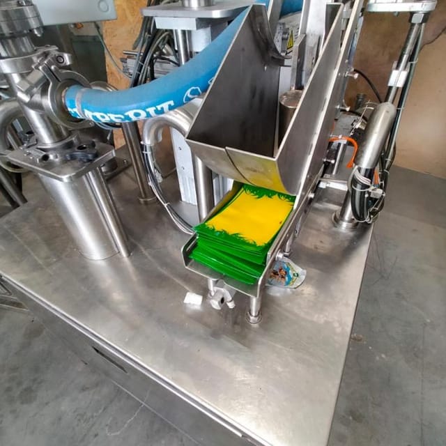 Фасовщик  жидких и густых продуктов в пакеты Дойпак е.2002