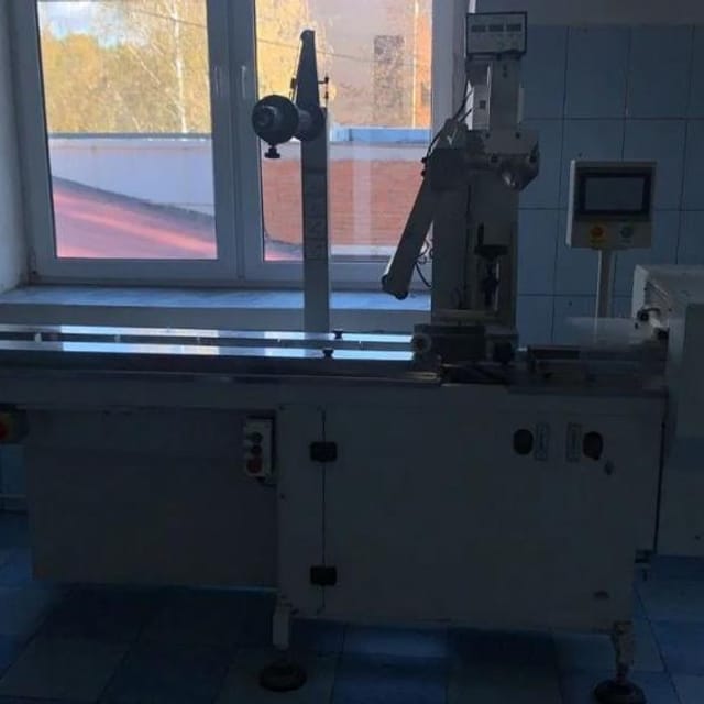 Горизонтальный упаковщик на серво приводе