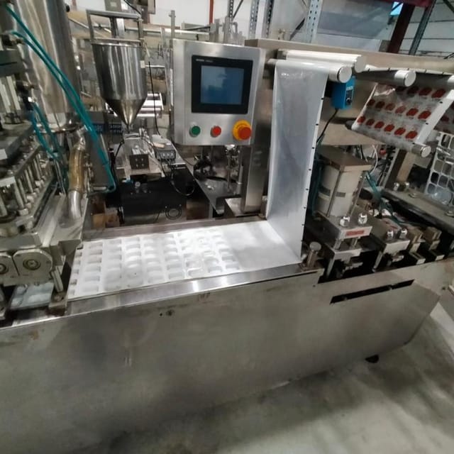 Фасовщик в ванночки Формопак (FormoPack) DPB 320H